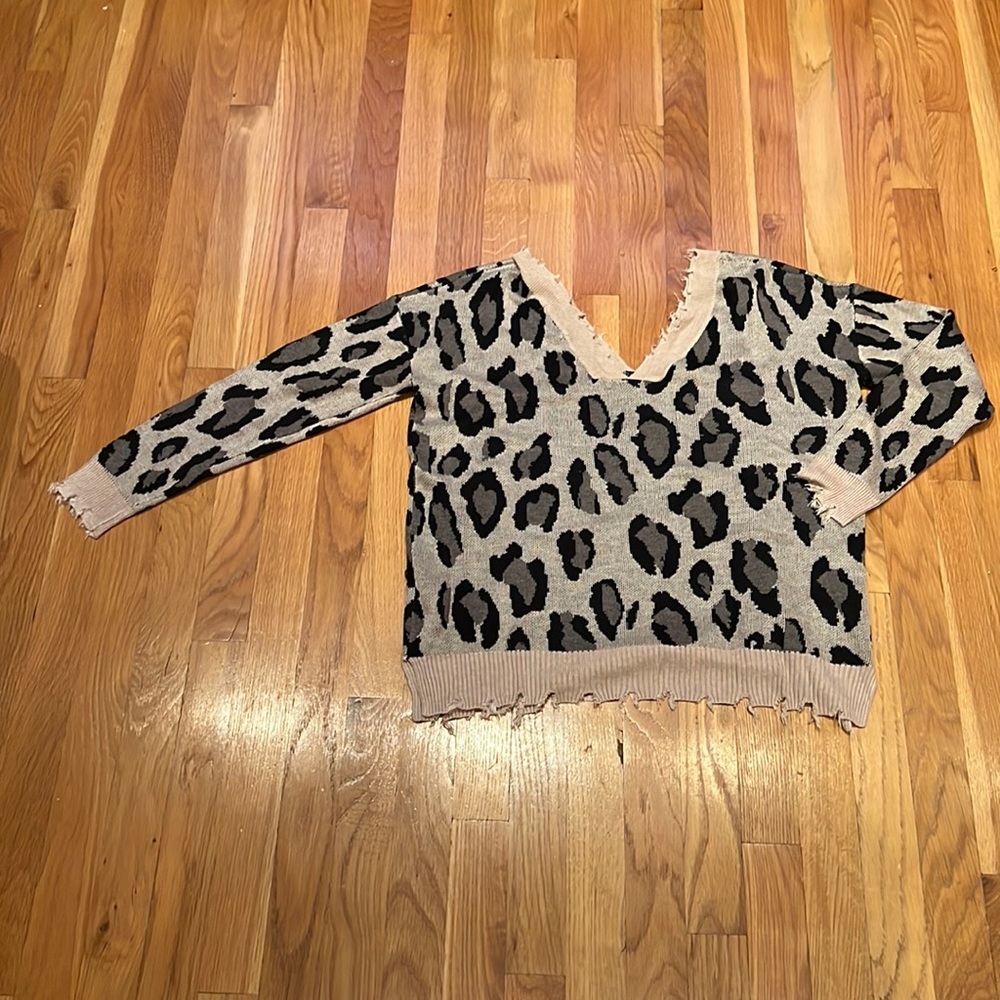 Ragged edge leopard print sweater